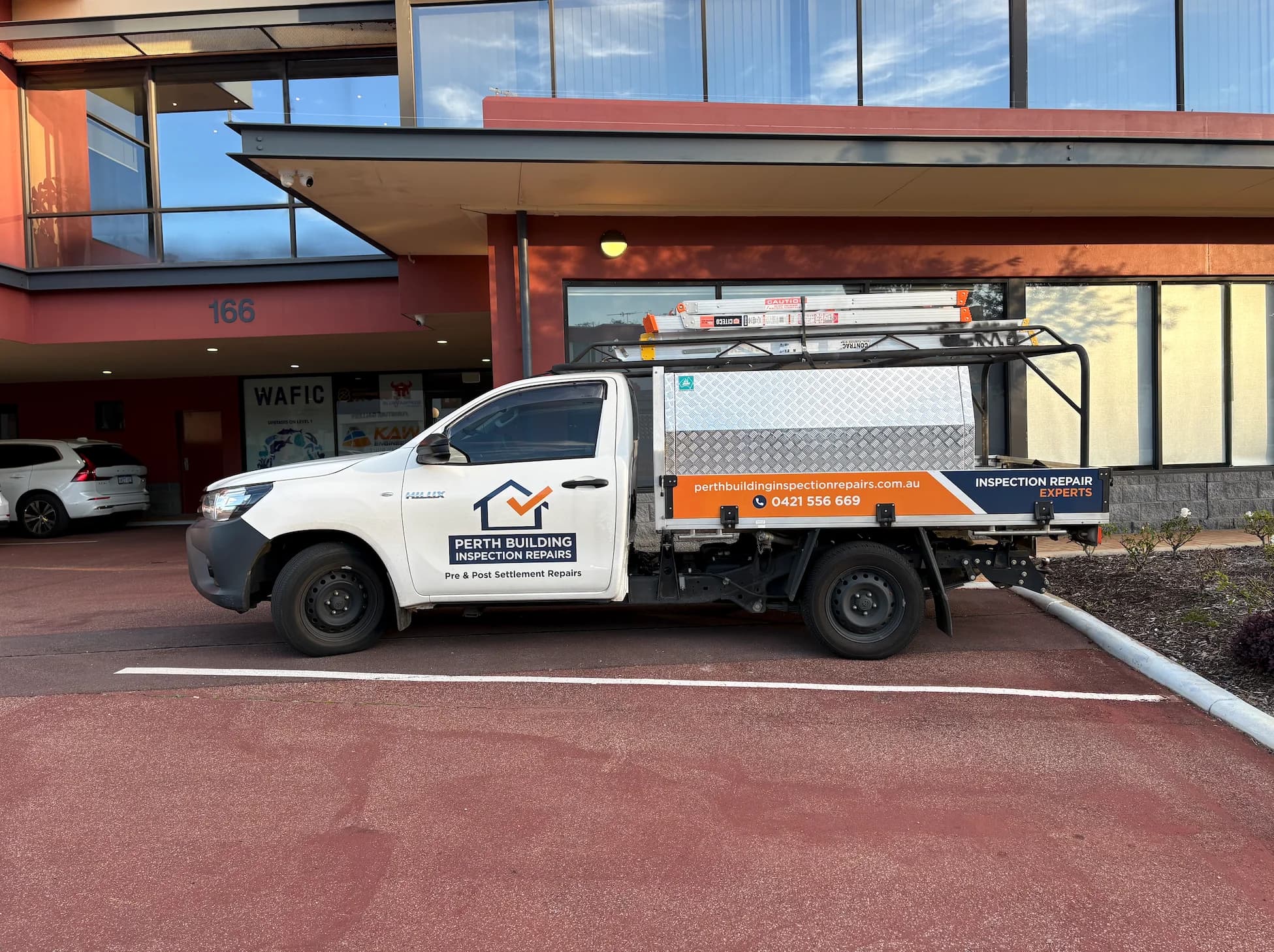 PBIR ute outside of a job site.
