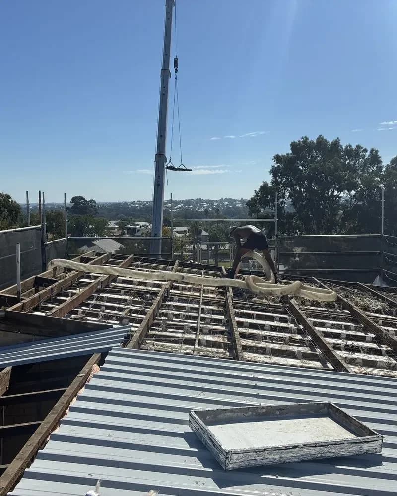 Roof sheeting lifted and craned on a Perth job